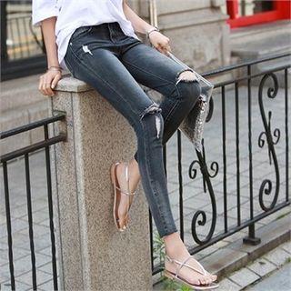 Slit-knee Distressed Skinny Jeans