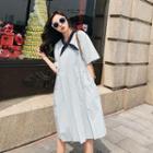 Short-sleeve Tie-neck Pleated A-line Dress
