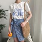 Set: Printed Short-sleeve T-shirt + Check A-line Skirt