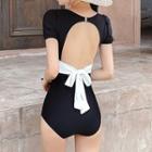 Set: Short-sleeve Open-back Swimsuit + Swim Skirt
