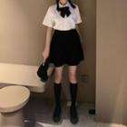 Short-sleeve Shirt With Bowtie / Pleated Mini A-line Skirt