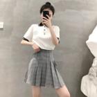 Striped Short-sleeve Polo Shirt / Check A-line Mini Skirt