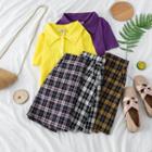 Set: Short-sleeve Plain Polo Shirt + Plaid Skirt