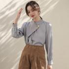 Long-sleeve Chained Asymmetrical Mock-neck Blouse