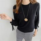 Long-sleeve Tie-cuff Knit Top