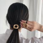 Perforated Metal Accent Hair Tie