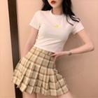 Short-sleeve Moon Embroidered T-shirt / Plaid Pleated Mini Skirt