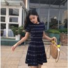 Set: Patterned Short Sleeve Knit Top + A-line Skirt