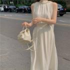 Sleeveless Tie-neck Chiffon Blouse / Midi A-line Skirt