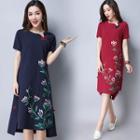Short-sleeve Floral Print A-line Qiapo Dress