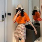 Elbow-sleeve Printed T-shirt / Patterned A-line Mini Skirt