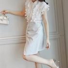 Set: Sleeveless Ruffled Blouse + A-line Skirt