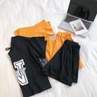Set:lettering Printed V-neck Short-sleeve Top + Plain Wide-leg Shorts