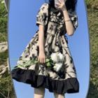 Puff-sleeve Floral Print A-line Dress Black Floral - Almond - One Size
