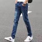 High-waist Ripped Jeans / Short-sleeve Plain T-shirt