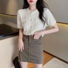 Short-sleeve Buttoned Knit Top / Fitted Mini Skirt