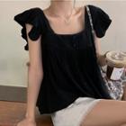 Sleeveless Ruffle Trim Button-up Top