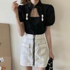 Balloon-sleeve Cutout Blouse / A-line Skirt