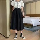 Short-sleeve Contrast Trim Buttoned Top / A-line Midi Skirt