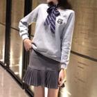 Embroidered Pullover With Tie / Mini Pleated Panel Skirt
