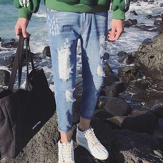 Distressed Cropped Tapered Jeans