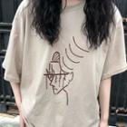 Printed Short-sleeve T-shirt / Plaid Wide-leg Pants