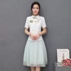 Set: Mandarin Collar Floral Embroidered Top + A-line Midi Skirt