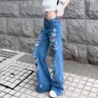 Low-rise Distressed Wide-leg Jeans