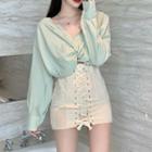 Mock Two-piece Long-sleeve Twist-front Top / Lace-up Mini Fitted Skirt