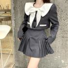 Tue-neck Blouse / Pleated A-line Skirt