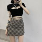 Short-sleeve Cut-out Top / Plaid Mini A-line Skirt
