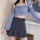 Puff-sleeve Cutout Top / Pleated Skirt