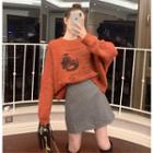 Loose-fit Printed Knit Sweater / Checker Mini Skirt