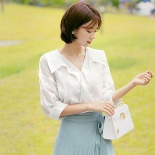 Open-placket Ruffled Blouse