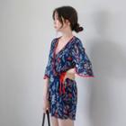 3/4-sleeve Wrap-front Floral Jumpsuit
