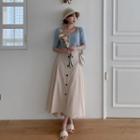 Buttoned Dip-back Maxi Flare Skirt