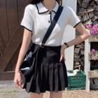 Short-sleeve Contrast Trim Knit Polo Shirt / A-line Mini Pleated Skirt