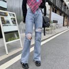 Mid-rise Ripped Straight Leg Jeans