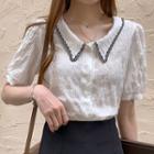 Short-sleeve Textured Buttoned Blouse