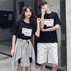 Couple Matching Short-sleeve Lettering T-shirt / Shorts / Striped A-line Skirt / Set