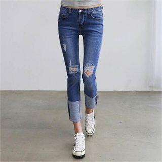 Low-rise Distressed Slim-fit Jeans
