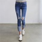 Low-rise Distressed Slim-fit Jeans
