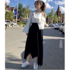 Long-sleeve Cut-out T-shirt / Asymmetrical Midi A-line Skirt