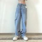 Low Rise Asymmetrical Distressed Straight Leg Jeans