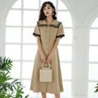 Elbow-sleeve Striped Trim Buttoned A-line Midi Dress