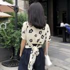Short-sleeve Floral Open-back Blouse
