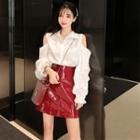 Set: Long-sleeve Cold Shoulder Shirt + Faux Leather A-line Mini Skirt