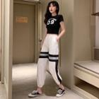 Lettering Cropped Short-sleeve T-shirt / Color Block Sweatpants