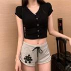 Cap-sleeve Top / Cross Embroidery Shorts