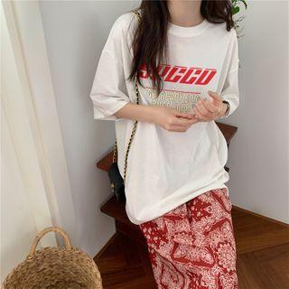 Short-sleeve Letter Printed T-shirt / High-waist Pattern Printed Midi Skirt